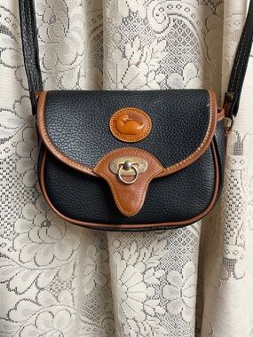 Vintage Dooney & Bourke Black with Brown Trim Pebbled Leather Crossbody